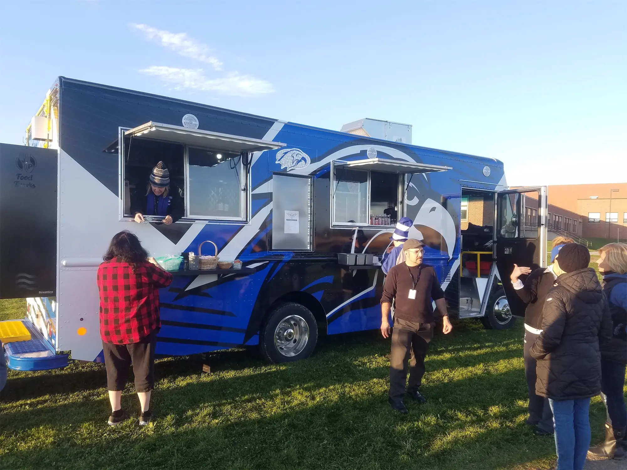 Falcon Pride truck, outside, view of the right side with windows open