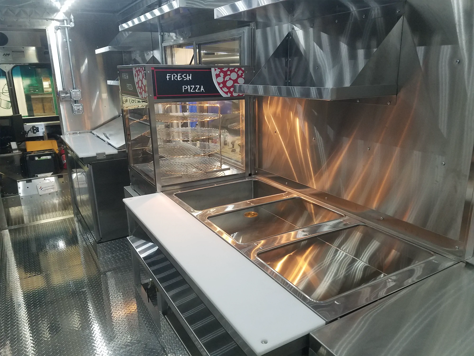 Falcon Pride truck, inside, water pans