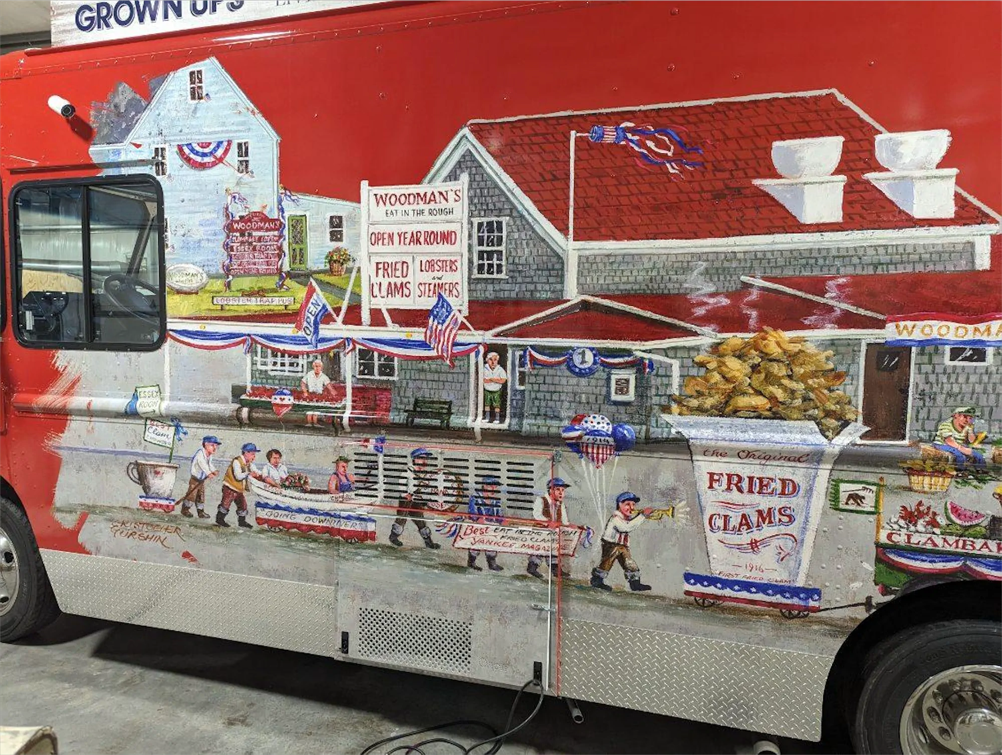 Woodman's truck, outside, view of the left side wrap