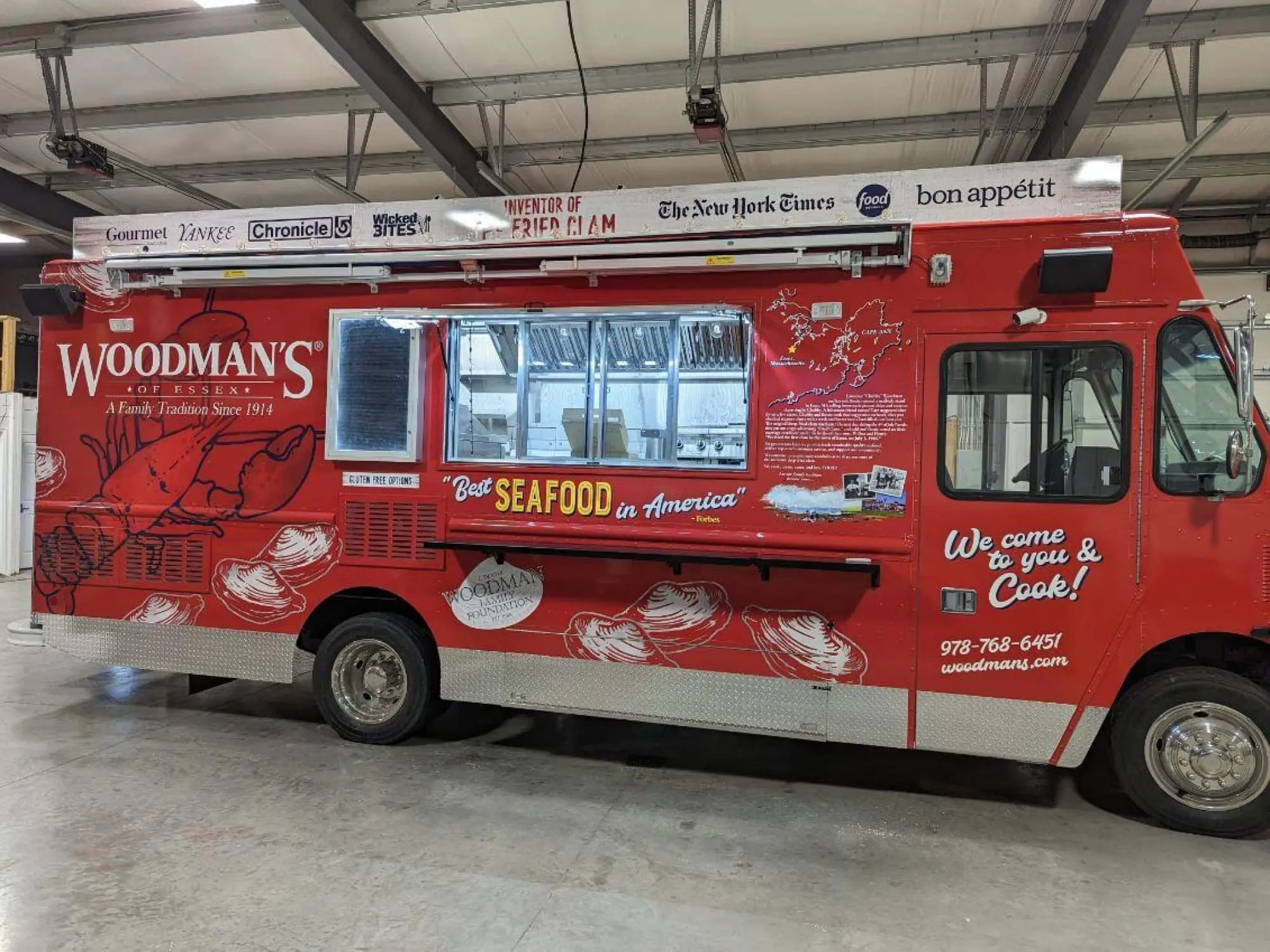 Woodman's truck, outside, view of the right side with awning up