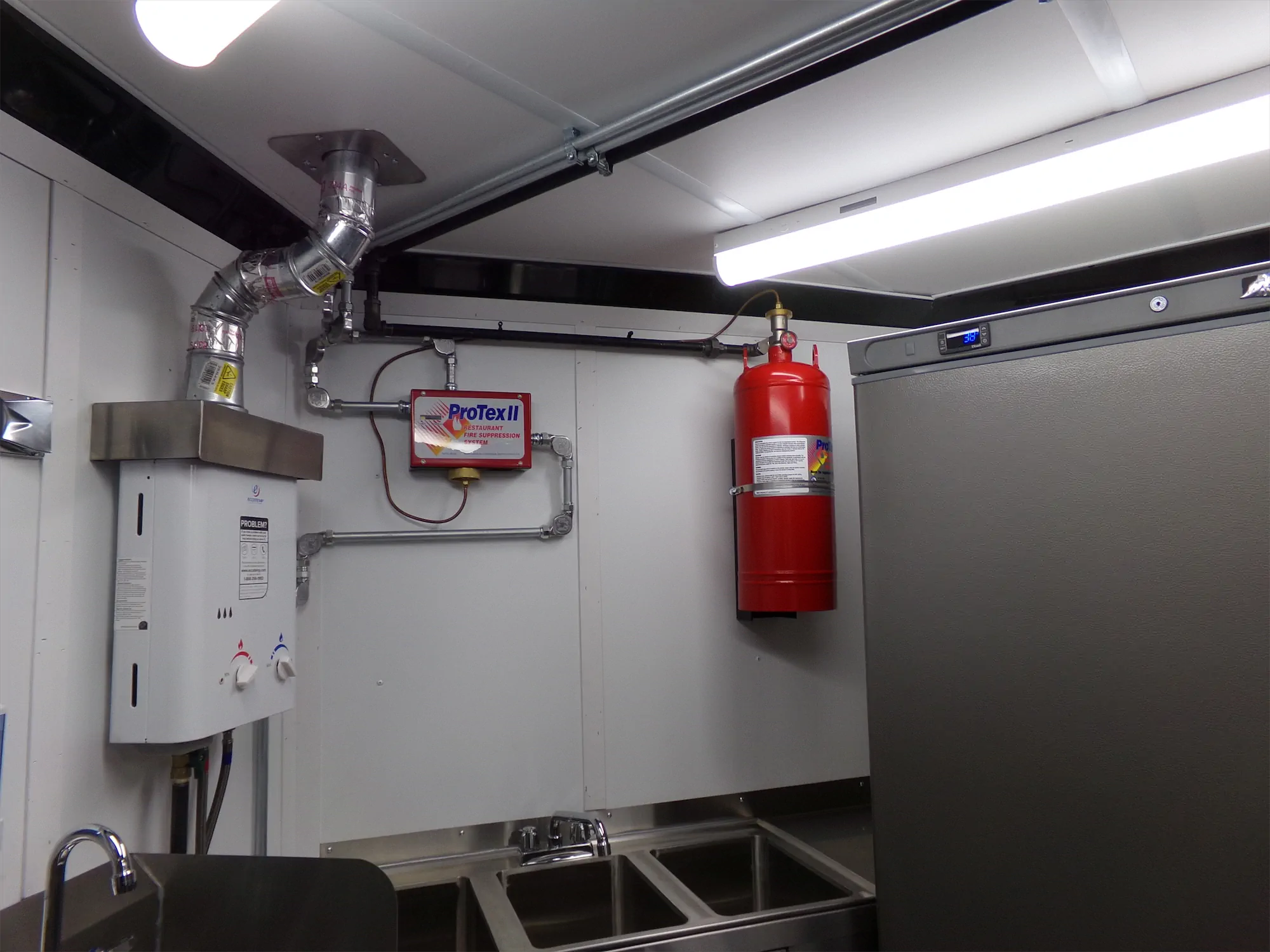 Buffalo Bros Burgers trailer, inside, extinguisher