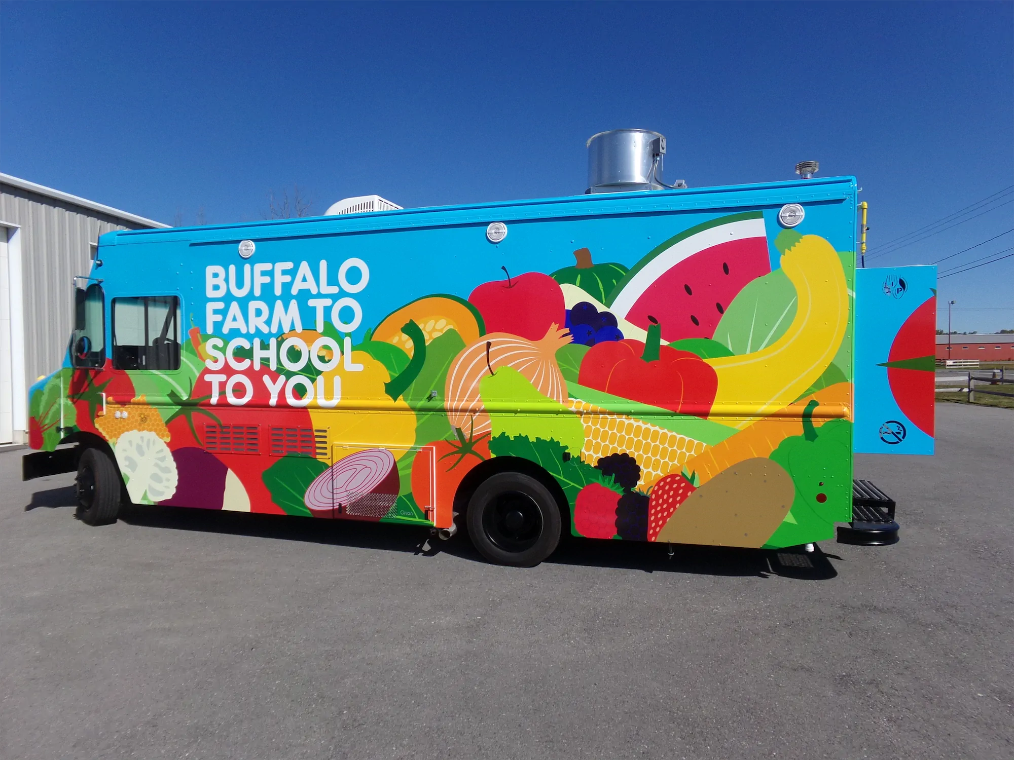 Buffalo Farm to School to you truck, outside, looking at the left side