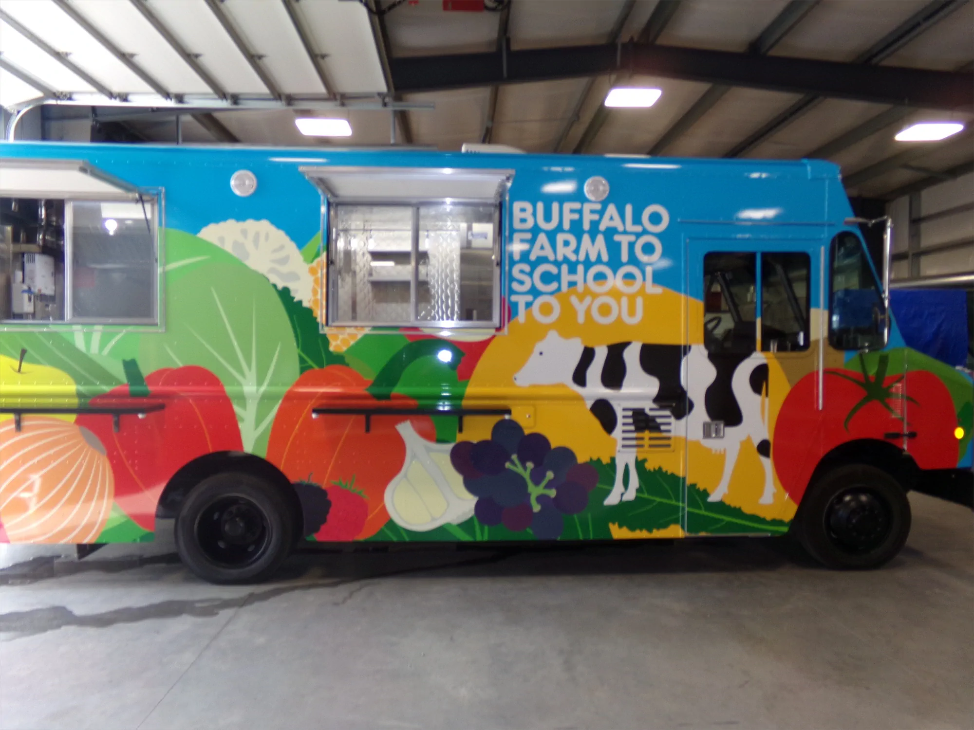 Buffalo Farm to School to you truck, outside, looking at the right side