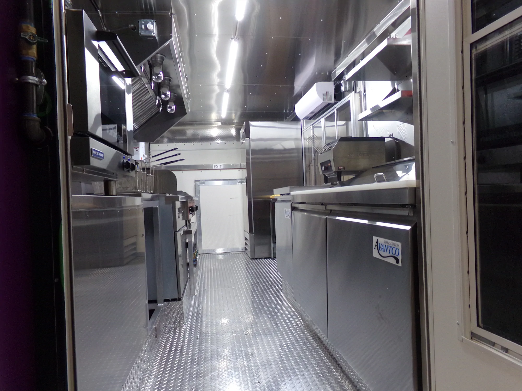 Edgy Vegy Buffalo truck, inside, looking down the length of the truck to the back door