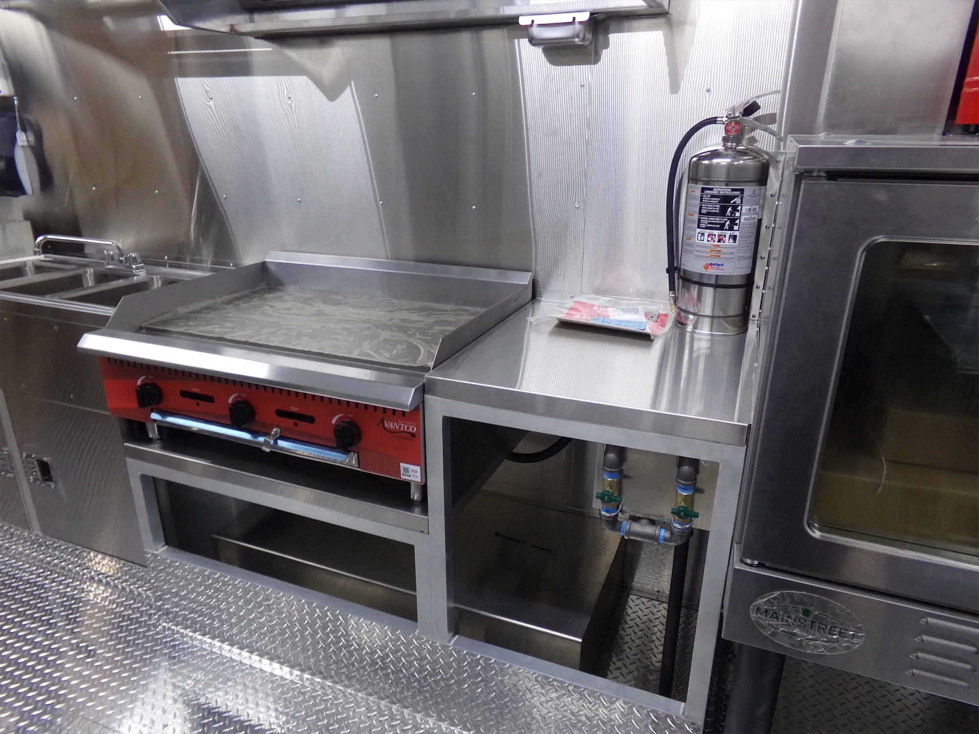 Real Food On The Move truck, inside, grill