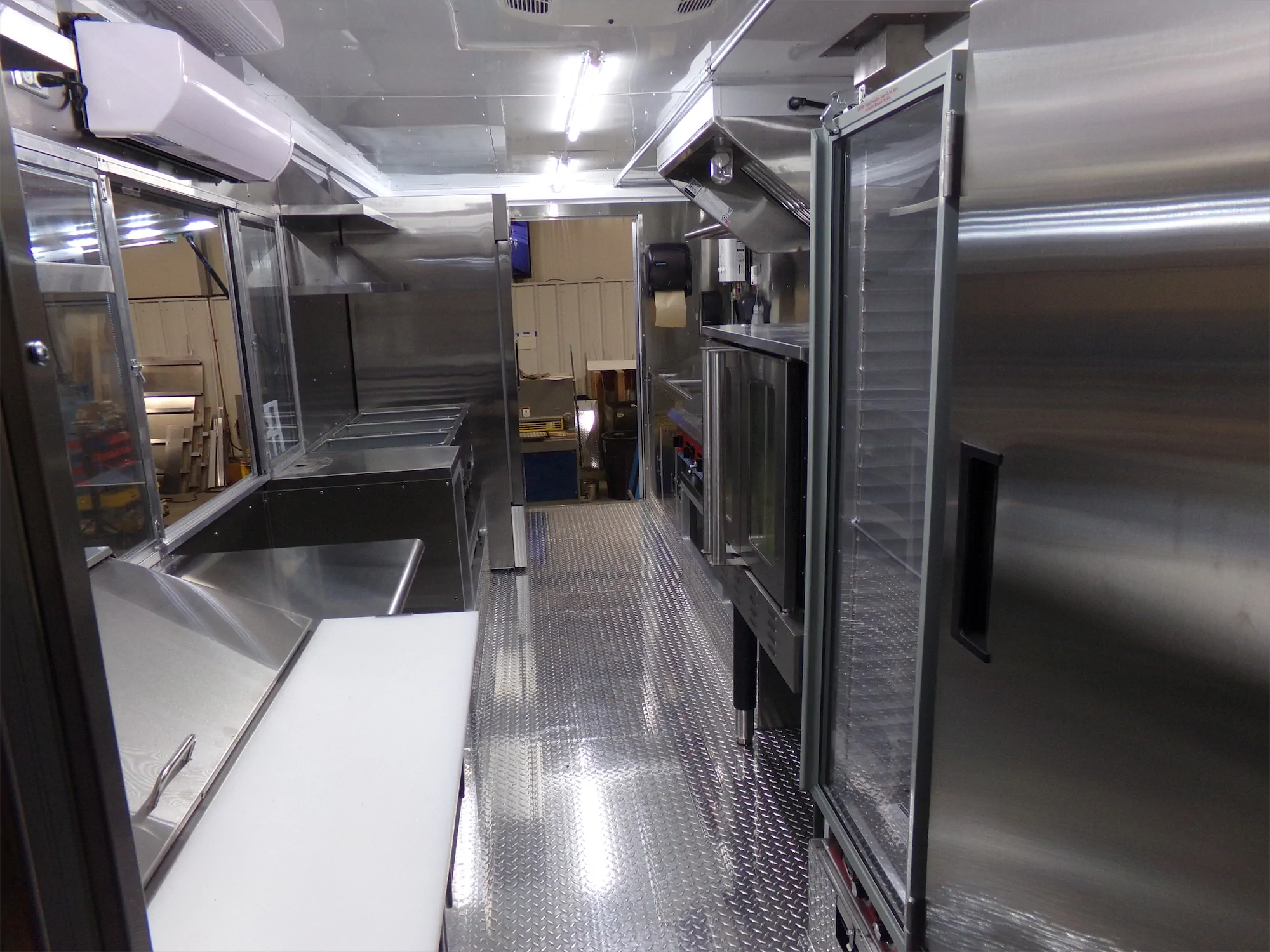 Real Food On The Move truck, inside, looking down the truck at the exit door