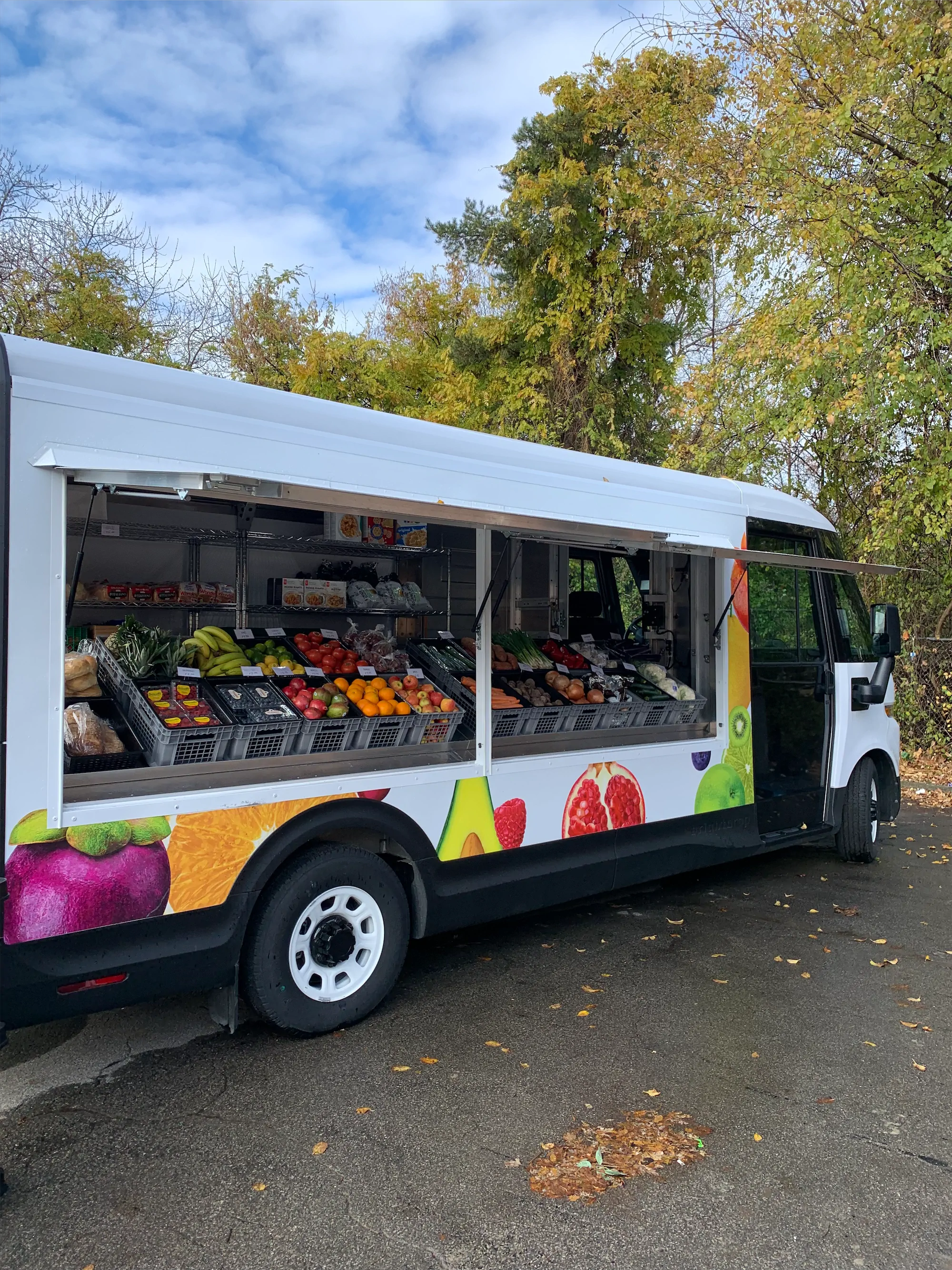 Grow of the Go truck, outside, right side with windows open